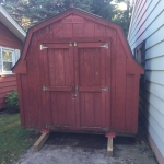 Shed tight up against house